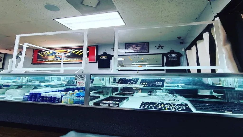 Fat Kat Tattoo & Body Piercing — Tattoo shop in Jacksonville