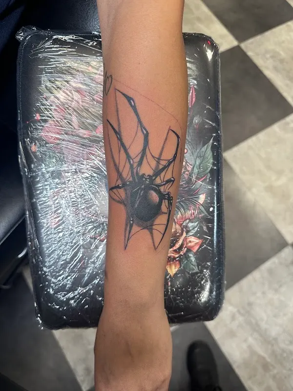 Black Poodle Ink — Tattoo shop in Archdale