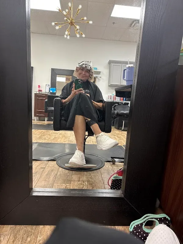 Flying Scissors Salon & Spa — Hair salon in Clermont