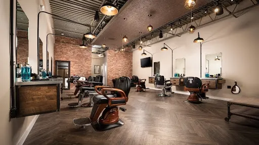 Plaza Barbers/art gallery — Barber shop in Lakewood